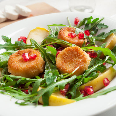 AIR FRIED GOAT CHEESE with SPRING GREENS, CANDIED PECANS & POMEGRANATE